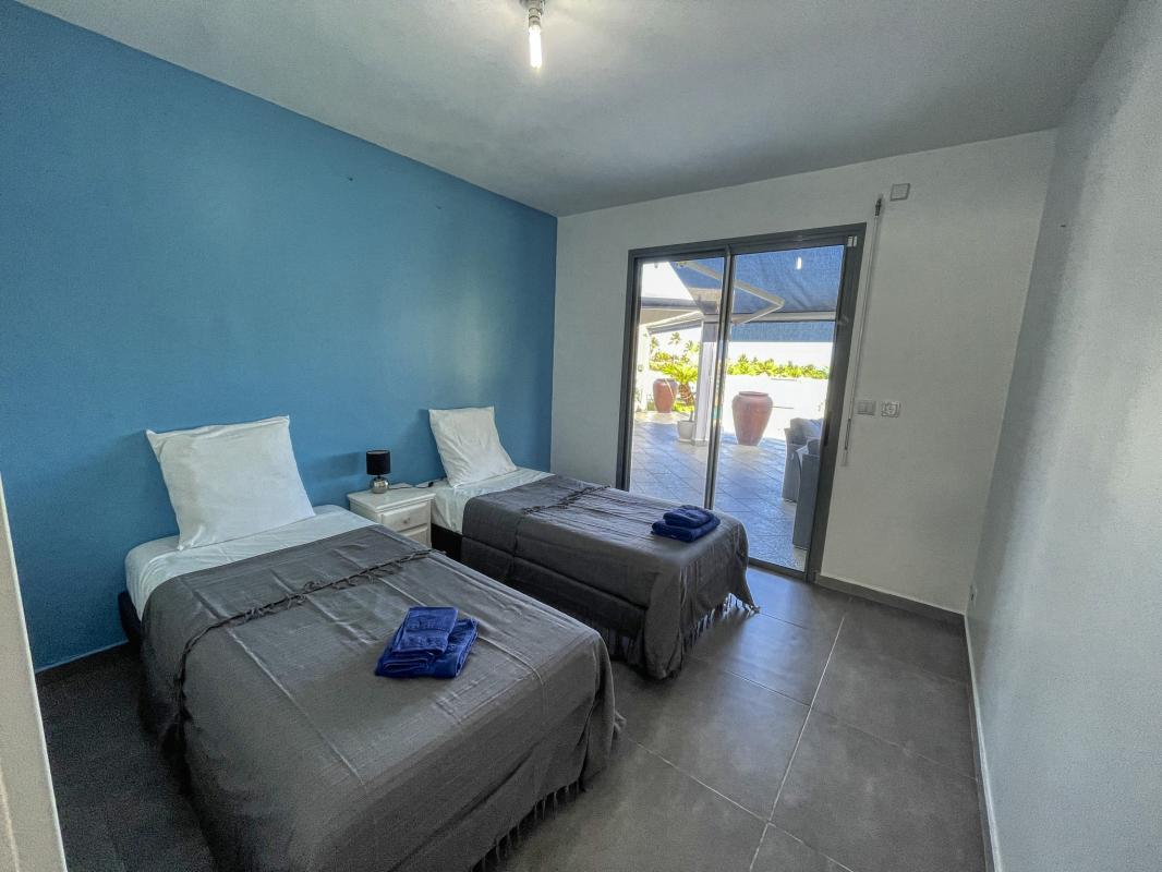 17 Location villa Andrea 3 chambres 6 personnes vue mer et piscine à sainte anne en guadeloupe - chambre 1